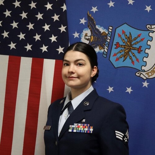 A Senior Airman poses for her official photo.