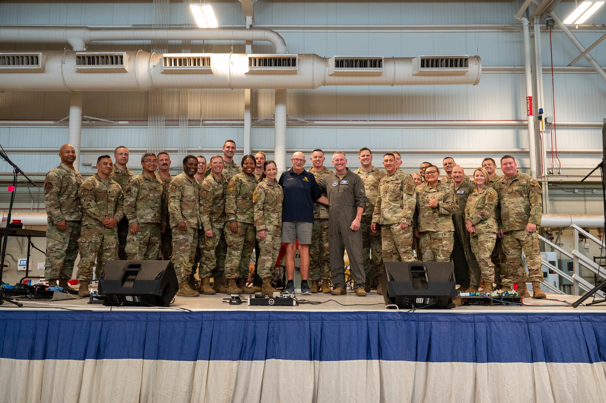 Members of the 56th Fighter Wing pose for a photo with Victor Peterson (center), retired community advocate, during an honorary commander farewell event, June 14, 2024, at Luke Air Force Base, Arizona.