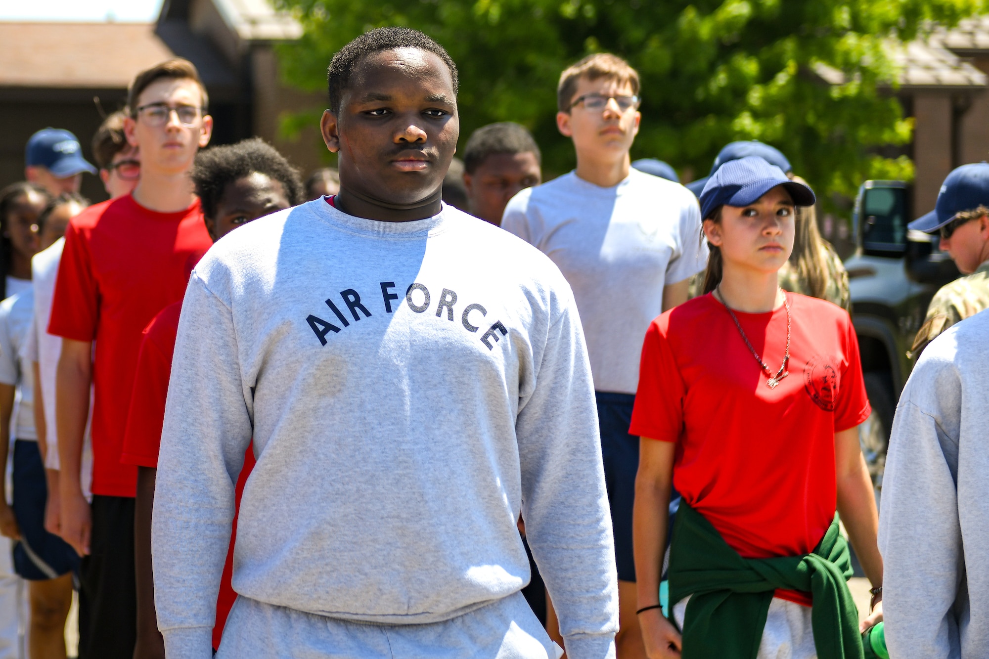 A Junior Reserve Officers' Training Corps cadet stands at attention amongst his peers on June 13, 2024, at Youngstown Air Reserve Station, Ohio.
