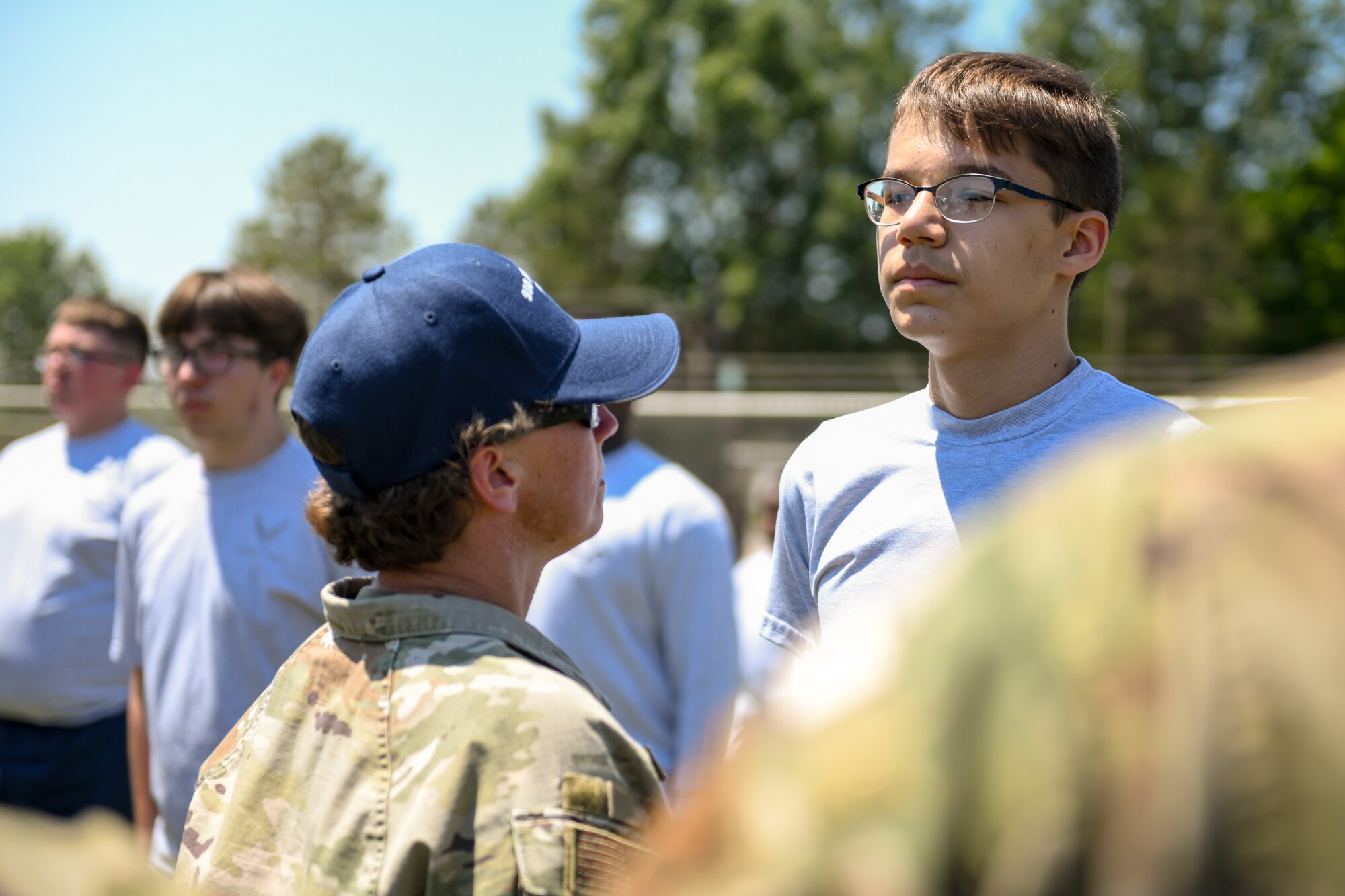 A Junior Reserve Officers' Training Corps cadet stands at attention among his peers on June 13, 2024, at Youngstown Air Reserve Station, Ohio.