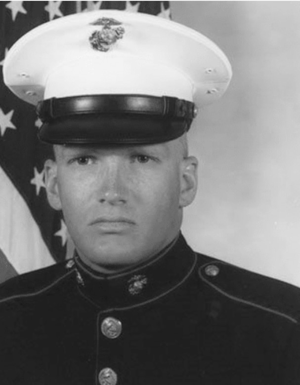 A young Marine poses for a photo.