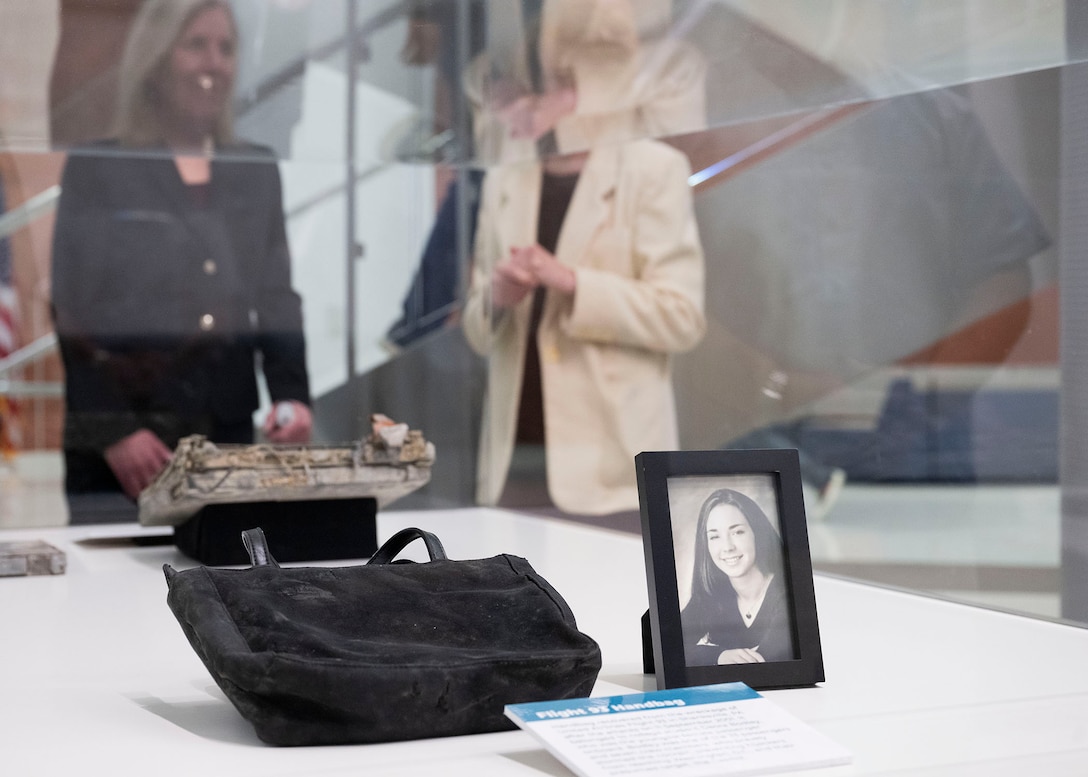 A display case showing a photo and the purse of Deora Bodley, killed as a passenger on Flight 93 on September 11, 2001.