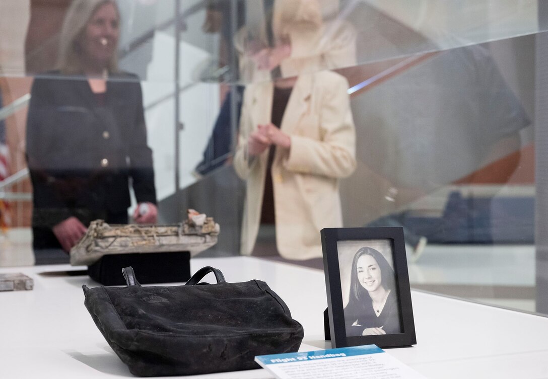 Picture of Flight 93 victim Deora Bodley, and the purse she carried on 9/11 on display at the 9/11 memorial at NSA/CSS Washington’s Morrison Center.