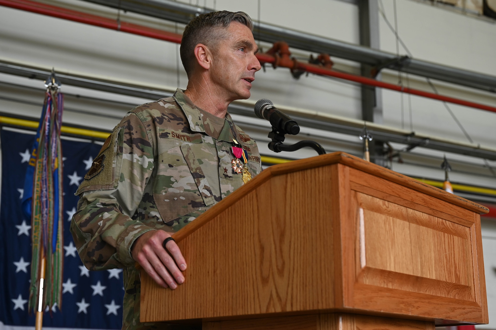 Brig. Gen. Shannon D. Smith, outgoing commander, District of Columbia Air National Guard, gives remarks at the change of command ceremony