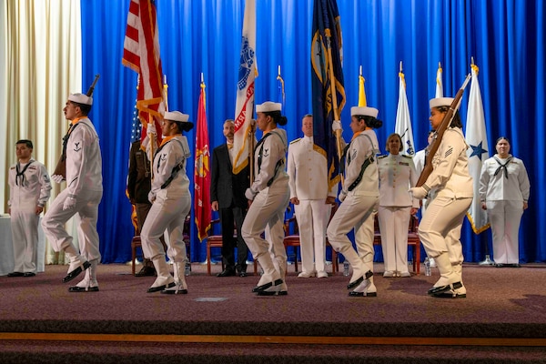 240607-N-JC800-1016 BETHESDA, Md. (Jun. 7, 2024) – The Naval Medical Leader and Professional Development Command color guard parade the colors during the graduation ceremony for the Naval Postgraduate Dental School. (U.S. Navy photo by Mass Communication Specialist 1st Class Heath Zeigler/Released)