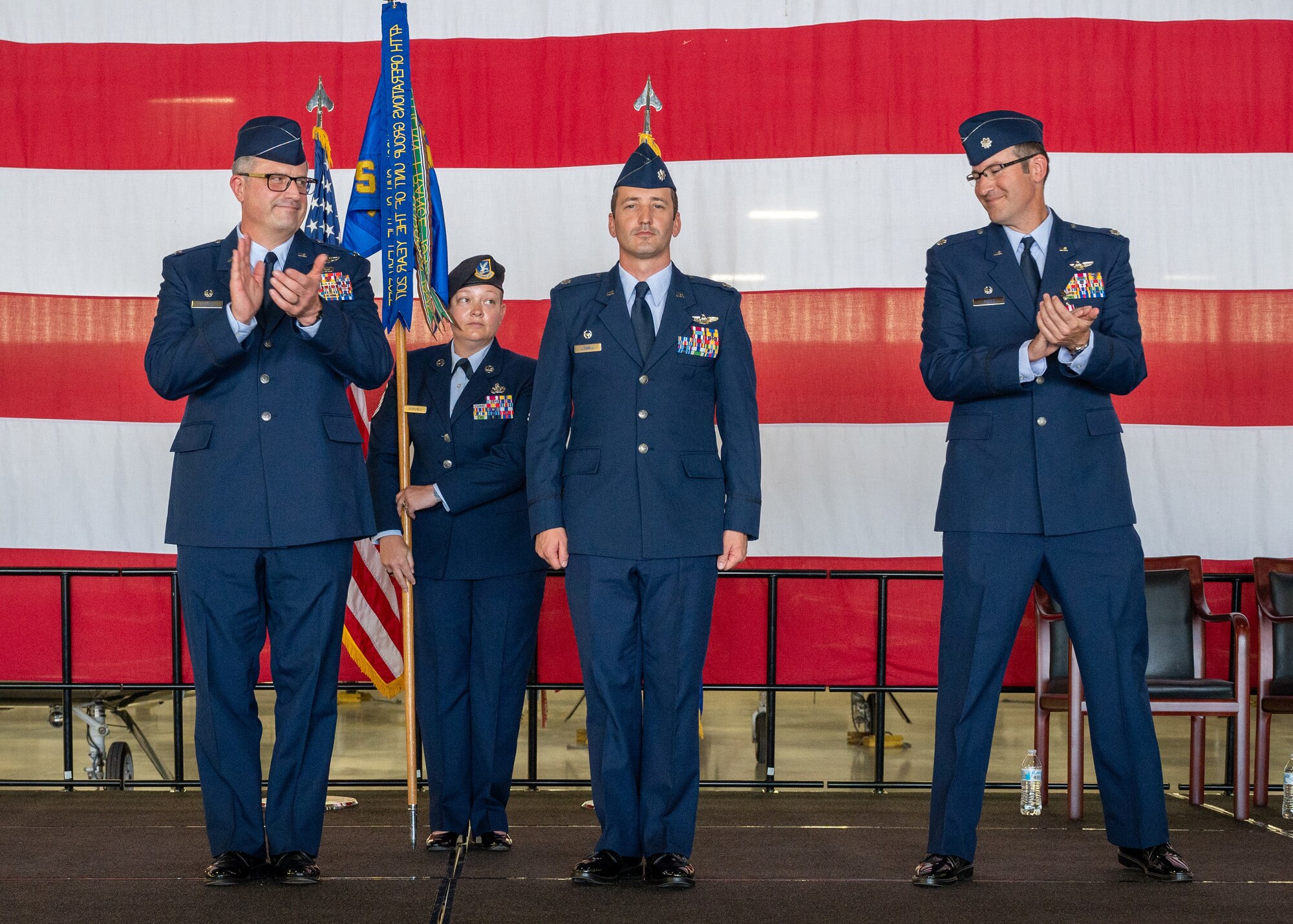 U.S. Air Force Lt. Col. Tory Lodmell, 86th Flying Training Squadron (FTS) commander, stands at attention after becoming the 86th Flying Training Squadron (FTS) commander at the 86th FTS change of command ceremony at Laughlin Air Force Base, Texas, June 14, 2024. As commander, Lodmell will overview the training and graduation of Air Force pilots flying the T-1A Jayhawk. (U.S. Air Force photo by Staff Sgt. Nicholas Larsen)