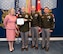 Top 13 recruiter poses with USAREC Commanding General Johnny Davis, USAREC Command Sergeant Major Shade Munday, and Secretary of the Army Christine Wormuth