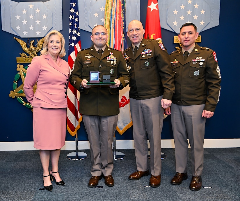 U.S. Army Top 13 recruiter poses with USAREC Commanding General Johnny Davis, USAREC Command Sergeant Major Shade Munday and Secretary of the Army Christine Wormuth