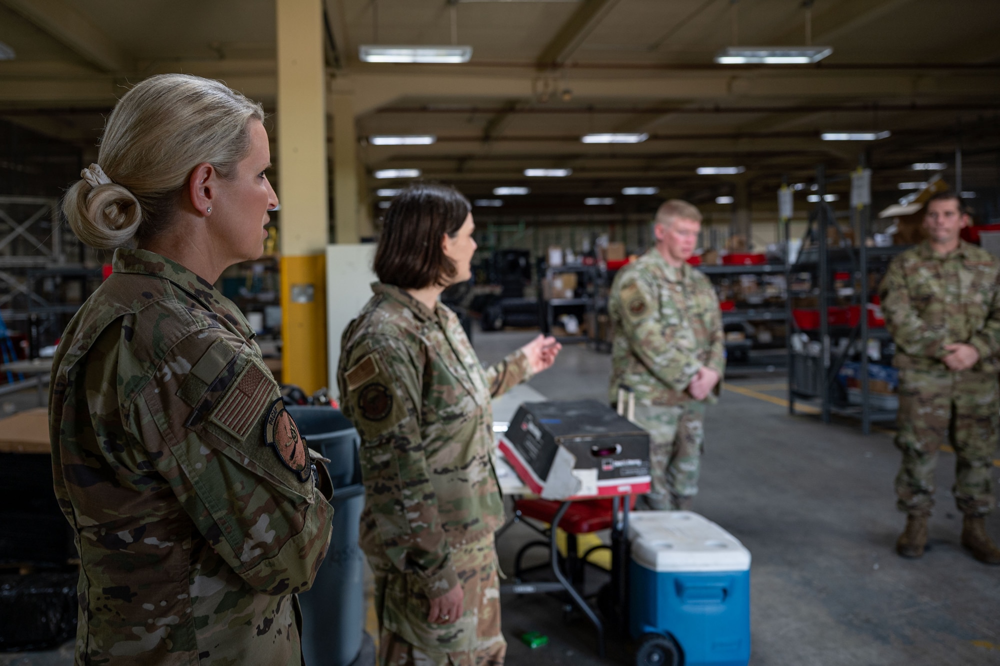 U.S. Air Force Lt. Gen. Laura Lenderman, left, Pacific Air Forces deputy commander, talks to Airmen assigned to the 36th Logistics Readiness Squadron during a tour at Andersen Air Force Base, Guam, June 13, 2024. Lenderman visited Andersen AFB to observe the Forward Edge’s mission sets. (U.S. Air Force photo by Senior Airman Jasmine M. Barnes)