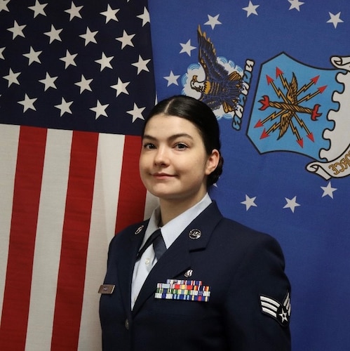 A Senior Airman poses for her official photo.