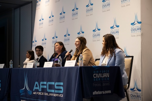 Previous PCIP interns answer questions from the audience.
