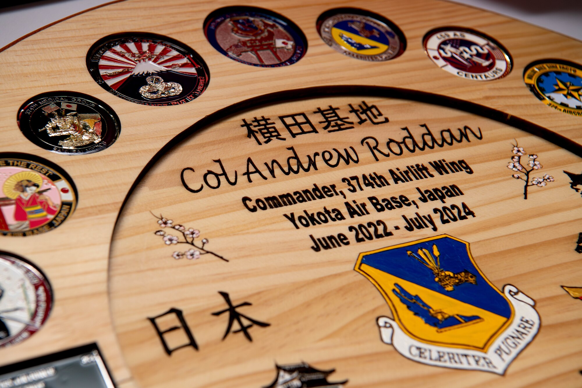 The 374th Medical Group gifted Col. Andrew Roddan, 374th Airlift Wing commander, a coin display to commemorate his leadership during his two-year tenure.