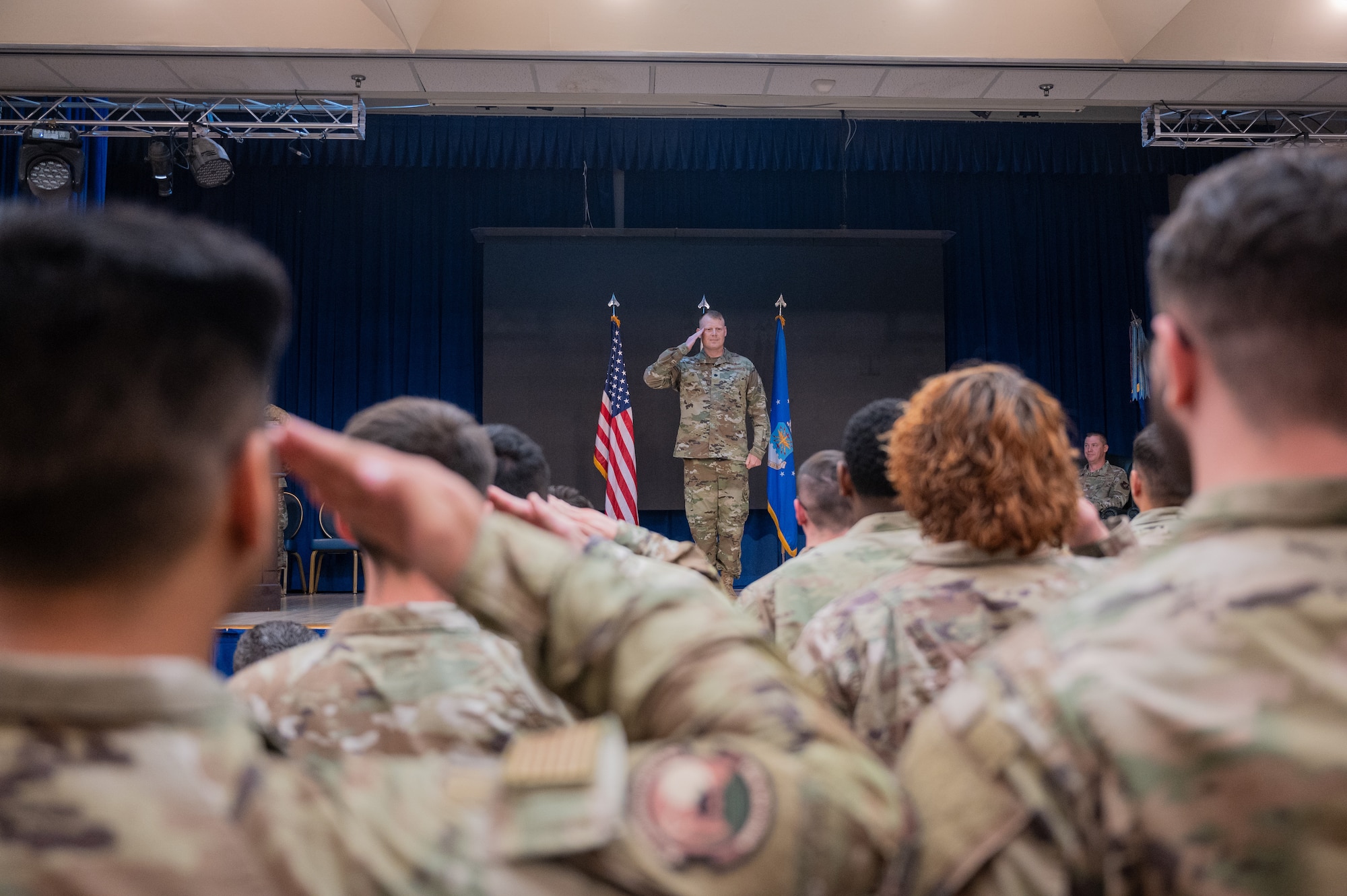 U.S. Air Force Lt. Col. Justin Lyon, 51st Communications Squadron commander, renders his first salute to Airmen from the 51st CS during a change of command ceremony at Osan Air Base, Republic of Korea, June 21, 2024. The 51st CS is responsible for delivering communications capabilities that support the fighter wing main operating base as well as four geographically separated units. (U.S. Air Force photo by Staff Sgt. Christopher Tam)