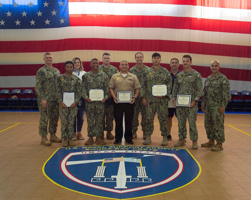Personnel assigned to Naval Support Activity Souda Bay, Greece, receive awards and recognitions from Capt. Odin J. Klug, commanding officer, NSA Souda Bay, during an awards ceremony on June 13, 2024.