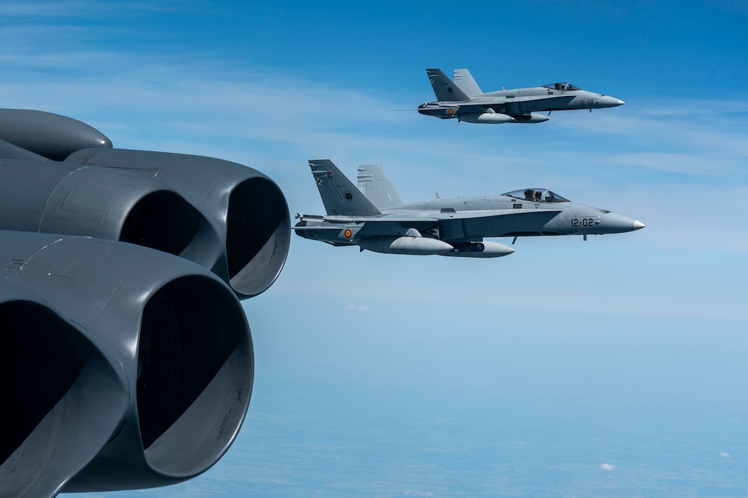 Bomber escorted by fighter jets