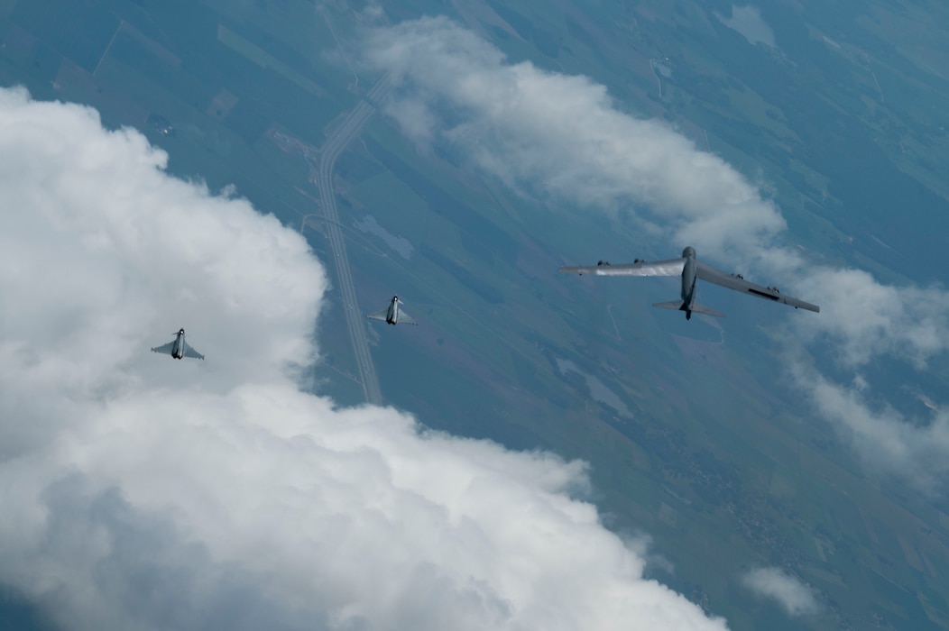 Bomber escorted by fighter jets