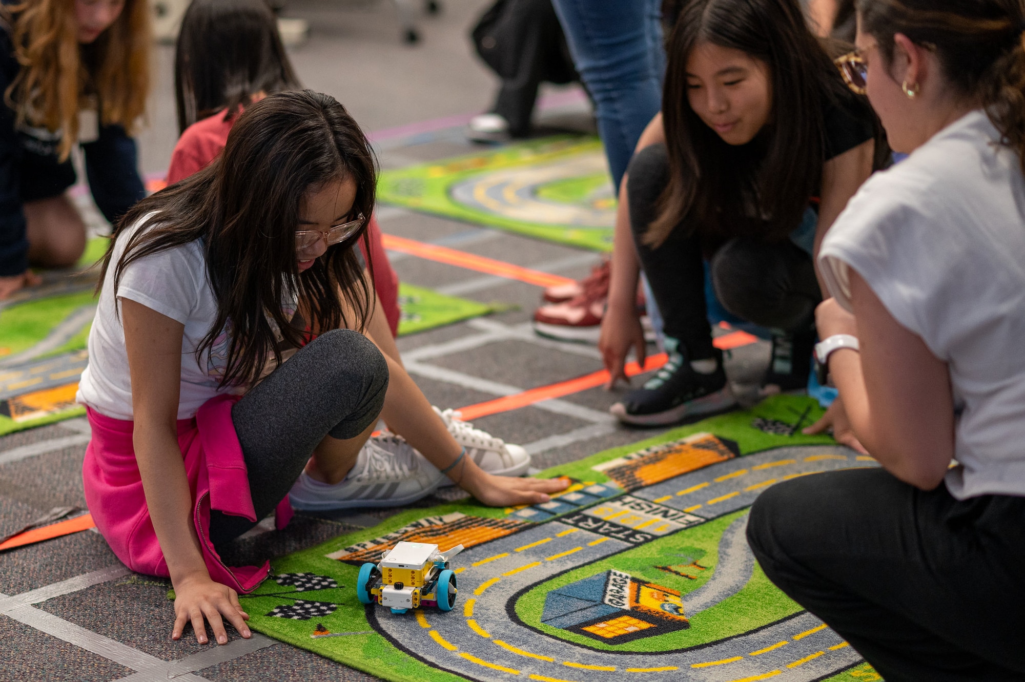 Students code robots