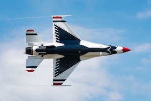 An F-16 Fighting Falcon from the U.S. Air Force Air Demonstration Squadron, the Thunderbirds, performs an aerial demonstration