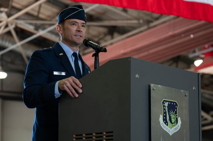 man speaking at ceremony