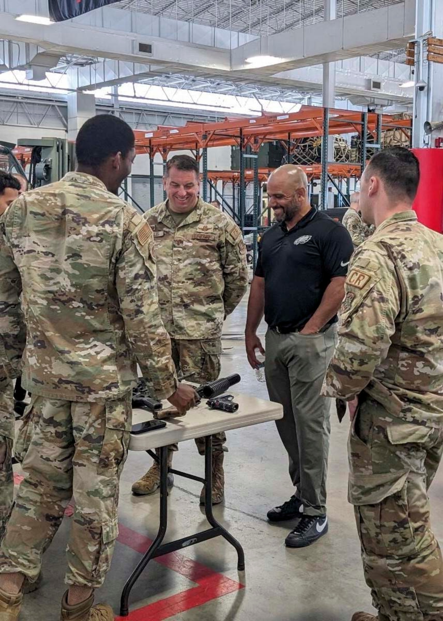 Coach Jamal Singleton, Philadelphia Eagles assistant coach, met with 621st Contingency Response Wing Airmen during a visit a visit to Joint Base McGuire-Dix-Lakehurst, N.J., June 10, 2024.