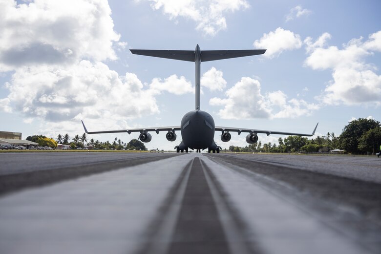 An Australian C-17 Globemaster III is staged for departure during Operation Render Safe Nauru at Nauru International Airport, Yaren, Nauru, May 24, 2024. Operation Render Safe is an Australian-led operation in Oceania to exchange explosive ordnance tactics, techniques, and procedures and reduce the risk of explosive remnants of war.  Marine Rotational Force – Darwin 24.3 explosive ordnance disposal technicians participated in Operation Render Safe 24 within the Republic of Nauru to reduce the risk of ERW and strengthen relationships with U.S. Allies and partners. (U.S. Marine Corps photo by Sgt. Cristian Bestul)