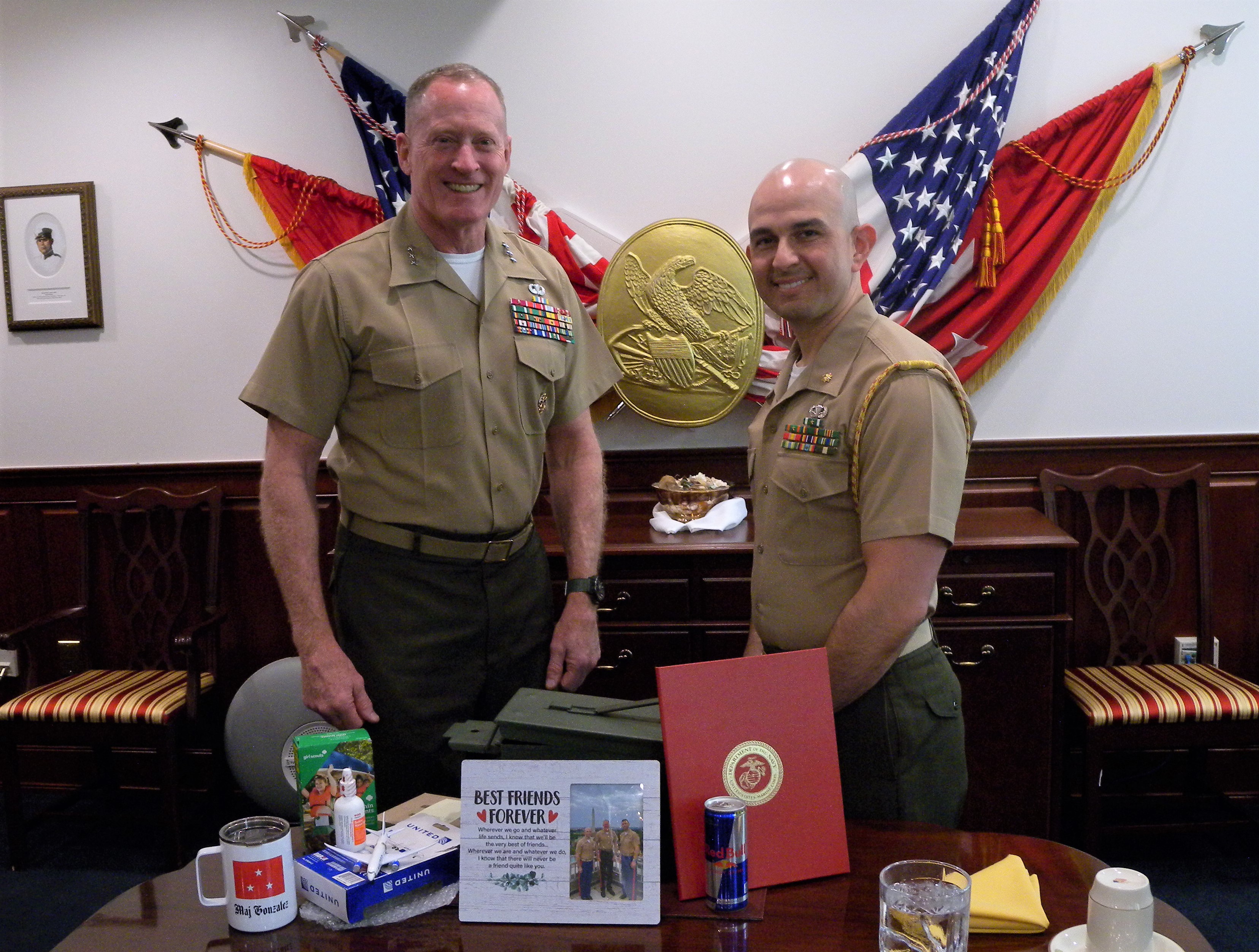 Maj. Daniel Gonzalez receives the Meritorious Service Medal award from Lt. Gen. Edward D. Banta.