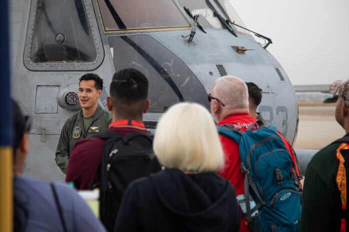 Capt. Aaron Orquia, a CH-53E pilot, speaks to educators as part of the 2024 Educators Workshop at Marine Corps Air Station Miramar in San Diego, California, June 6, 2024. Educators from Recruiting Stations Los Angeles, Orange, Riverside, and Sacramento visited Marine Corps Recruit Depot San Diego and other Marine Corps bases to observe recruit training and gain a better understanding about the transformation process recruits undergo to United States Marines. Educators also received classes and briefs on the benefits that are provided to service members in the United States armed forces. (U.S. Marine Corps photo by Cpl. Elliott A. Flood-Johnson)