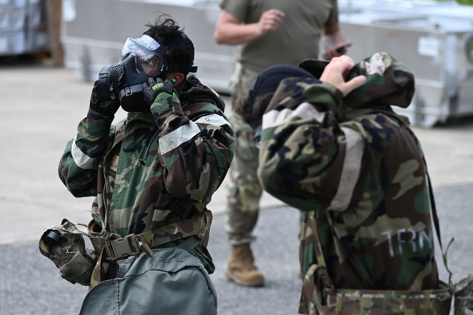 Airman put on chemical, biological, radiological or nuclear masks.