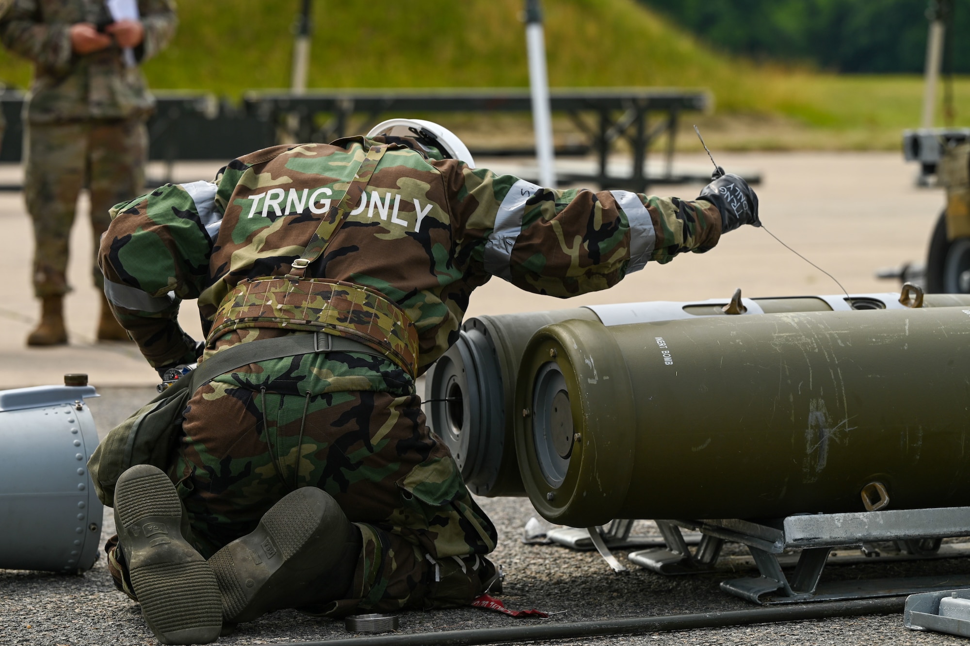 An Airman inspect munitions.