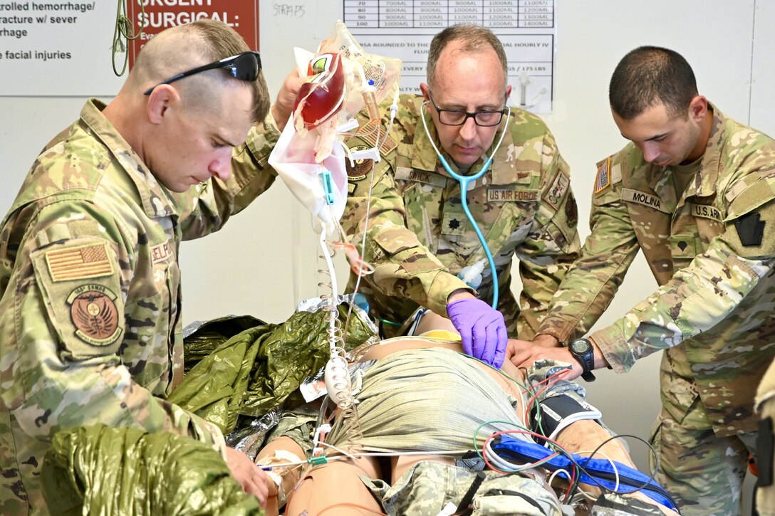 Medics from the 628th Aviation Support Battalion, 28th Expeditionary Combat Aviation Brigade and the 193rd Special Operations Wing trained together during Operation Guardian Angel June 18 at Fort Indiantown Gap, Pa. (U.S. Army National Guard photo by Spc. Jessica Barb)