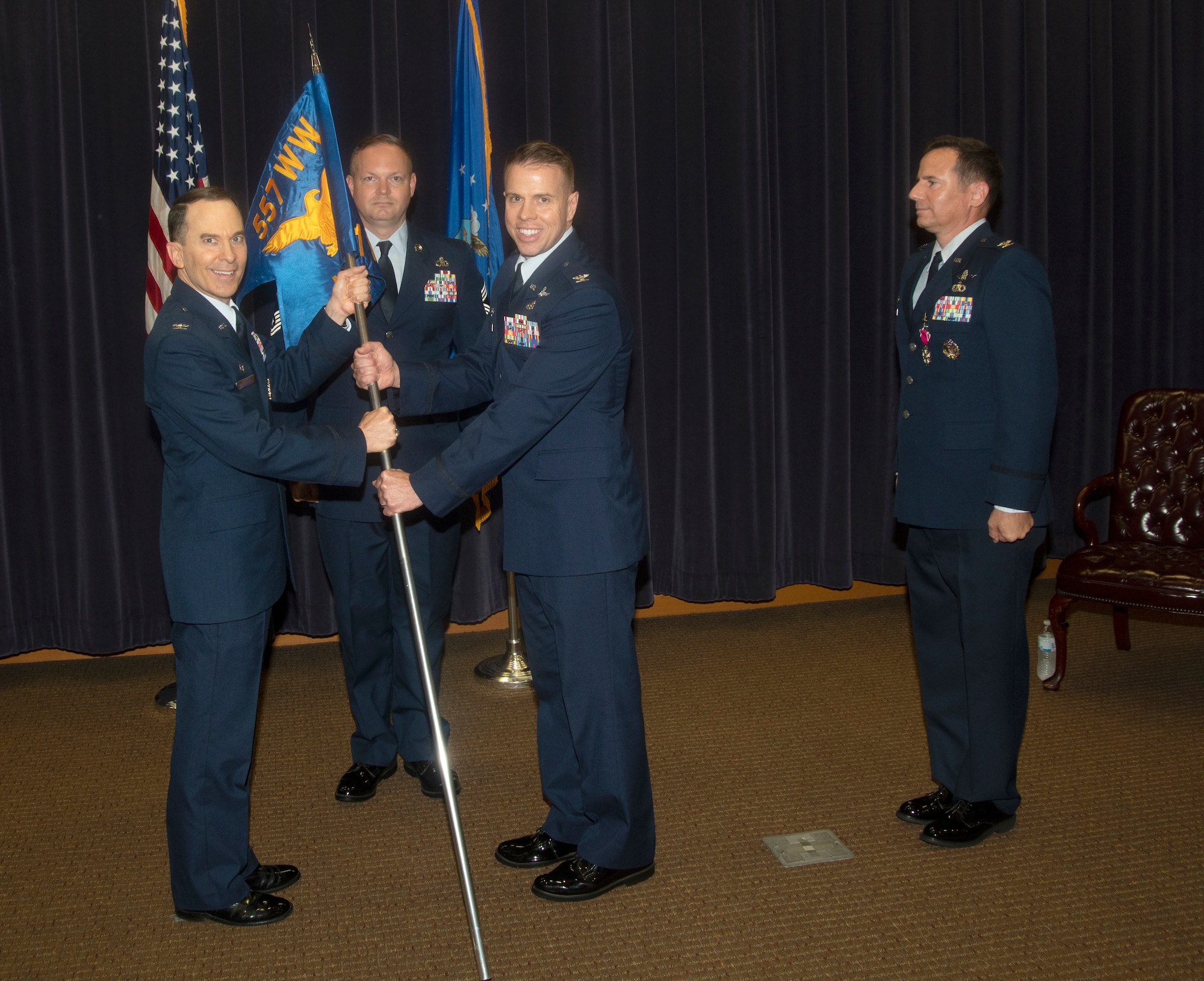 AF Colonels passing a flag