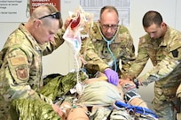 Medics from the 628th Aviation Support Battalion, 28th Expeditionary Combat Aviation Brigade and the 193rd Special Operations Wing trained together during Operation Guardian Angel June 18 at Fort Indiantown Gap, Pa. (U.S. Army National Guard photo by Spc. Jessica Barb)