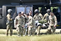 Medics from the 628th Aviation Support Battalion, 28th Expeditionary Combat Aviation Brigade and the 193rd Special Operations Wing trained together during Operation Guardian Angel June 18 at Fort Indiantown Gap, Pa. (U.S. Army National Guard photo by Spc. Jessica Barb)