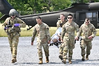 Medics from the 628th Aviation Support Battalion, 28th Expeditionary Combat Aviation Brigade and the 193rd Special Operations Wing trained together during Operation Guardian Angel June 18 at Fort Indiantown Gap, Pa. (U.S. Army National Guard photo by Spc. Jessica Barb)