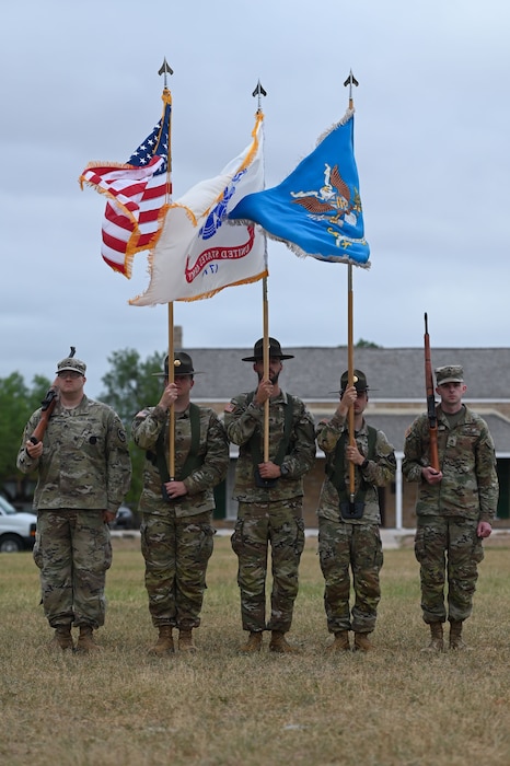 U.S. Army Color Guard stand at the 344th Military Intelligence Battalion change of command ceremony at Fort Concho, San Angelo, Texas, June 18, 2024. The Color Guard played an essential role in the ceremonious passing of the guide-on between commanders. (U.S. Air Force photo by Airman 1st Class Brian Lummus)