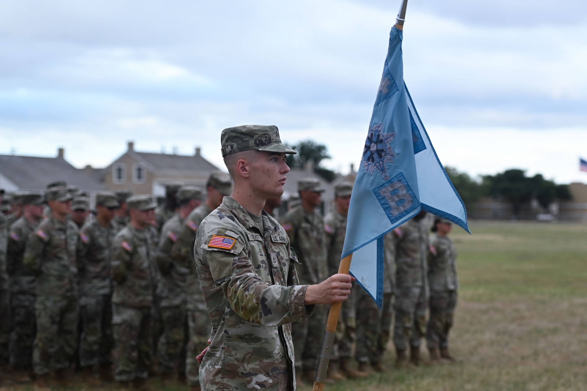 U.S. Army Soldiers from the 344th Military Intelligence Battalion stand at parade rest during the 344th MI BN change of command ceremony at Fort Concho, San Angelo, Texas, June 18, 2024. The battalion was tasked with giving the incoming commander their first salute when taking command. (U.S. Air Force photo by Airman 1st Class Brian Lummus)