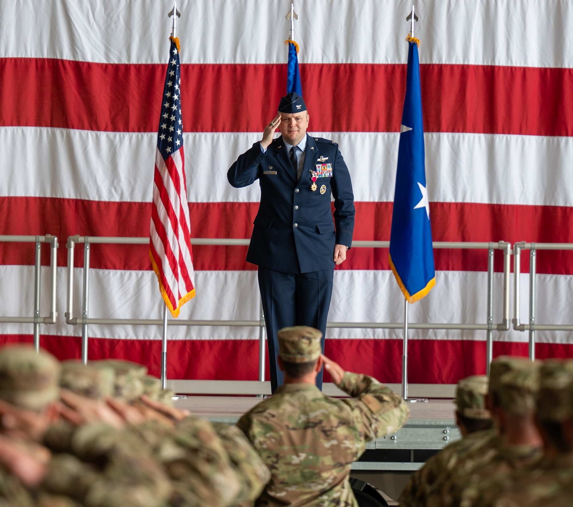 A man salutes.