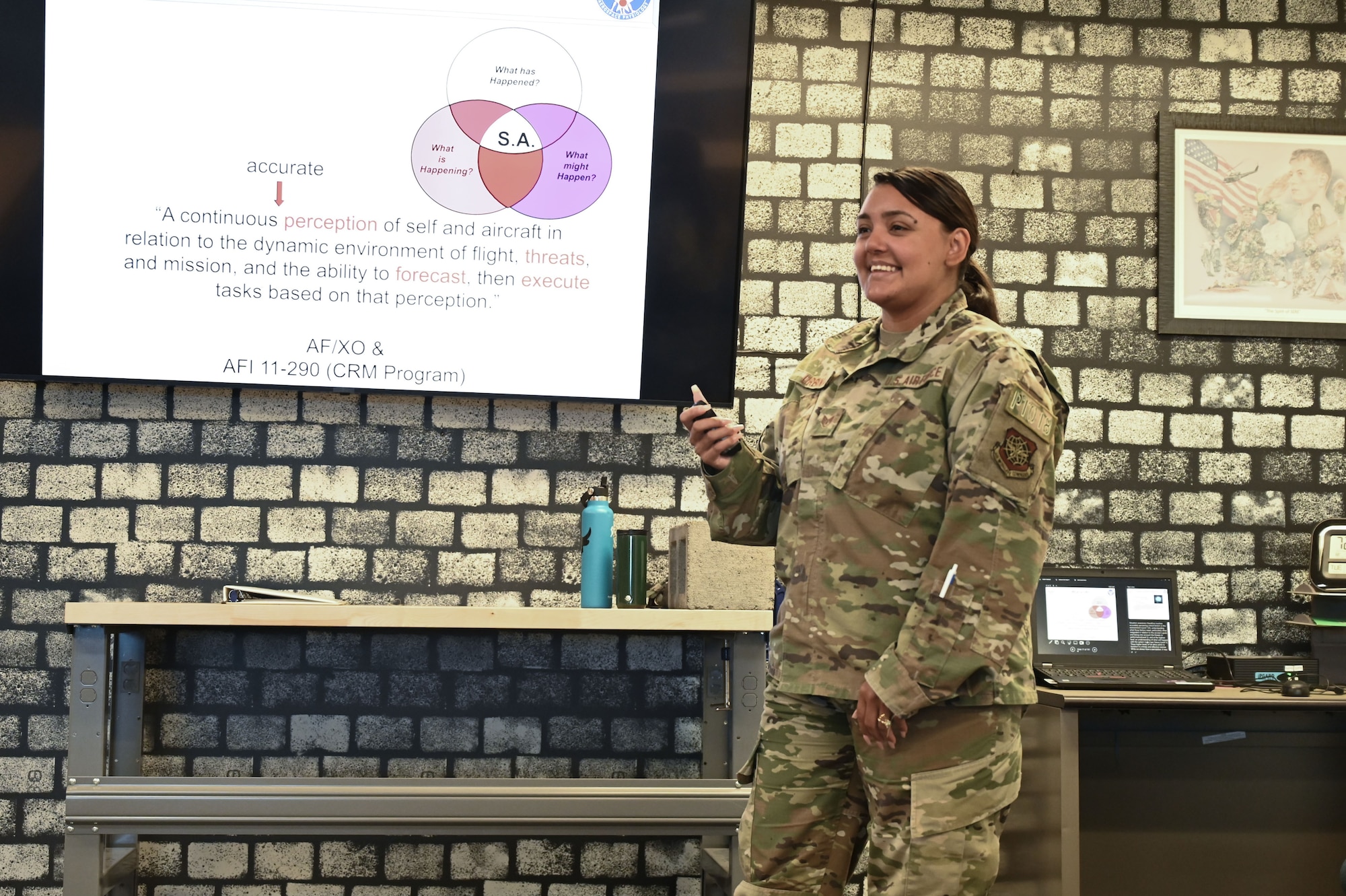 U.S. Air Force Staff Sgt. Alejandra Urbina, 62d Operation Support Squadron NCO in charge of aerospace physiology, teaches a class at Joint Base Lewis-McChord, Washington, June 18, 2024. Urbina, the 2023 Air Mobility Command Aerospace Physiologist Instructor of the Year, is the sole aerospace physiologist assigned to the 62d Airlift Wing and is responsible for ensuring Team McChord Airmen stay up to date with their training. (U.S. Air Force photo by Airman 1st Class Kylee Tyus)