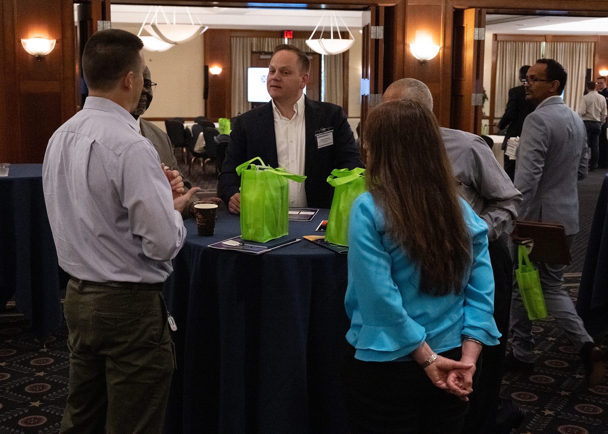 Attendees converse during the Small Business Summit at Joint Base Andrews, Md., June 13, 2024.