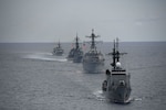 240616-N-N0824-0100 SOUTH CHINA SEA (June 16, 2024) The Armed Forces of the Philippines’ Gregorio del Pilar-class patrol ship BRP Andres Bonifacio (PS 17), front, sails in formation with the Arleigh Burke-class guided-missile destroyer USS Ralph Johnson (DDG 114), the Japan Maritime Self-Defense Force (JMSDF) ship JS Kirisame (DD 104), and the Royal Canadian Navy Halifax-class frigate HMCS Montreal (FFH 336) in the South China Sea during a multilateral Maritime Cooperative Activity (MCA) between Canada, Japan, the Philippines, and the United States, June 16, 2024. Participating units include the Montreal (FFH 336), the Kirisame, the Andres Bonifacio, and the Ralph Johnson. MCAs demonstrate a collective commitment to promote and strengthen regional and international cooperation in support of a free and open Indo-Pacific. Ralph Johnson is forward deployed and assigned to Destroyer Squadron (DESRON) 15, the Navy’s largest DESRON and the U.S. 7th fleet’s principal surface force. U.S. 7th Fleet is the U.S. Navy's largest forward-deployed numbered fleet, and routinely interacts and operates with allies and partners in preserving a free and open Indo-Pacific region. (Courtesy Photo)