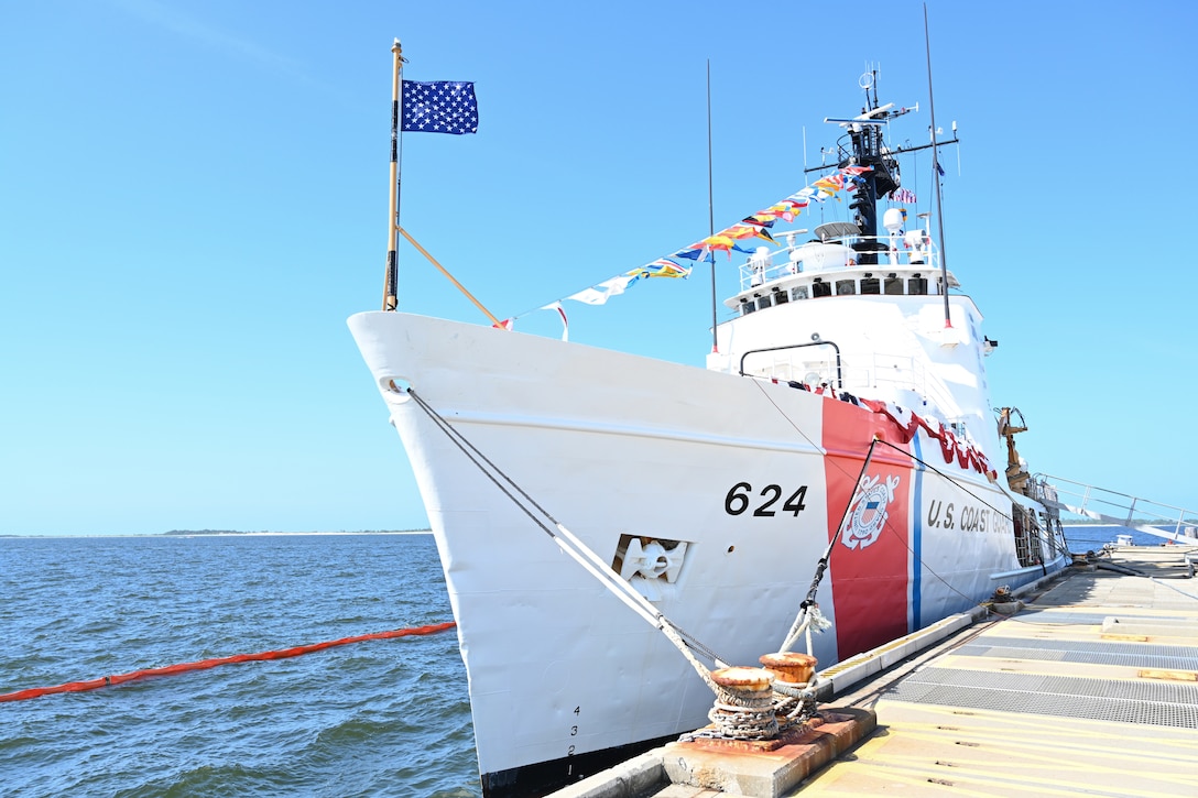 U.S. Coast Guard Cutter Dauntless (WMEC 624) is moored to the pier in full-dress, June 21, 2024, for the cutter's heritage recognition ceremony in Pensacola, Florida. Dauntless was recognized for 56 years of service to the nation in the presence of current and former crew members, family, and friends before it was placed in commission, special status. (U.S. Coast Guard photo by Petty Officer 2nd Class Brandon Hillard)