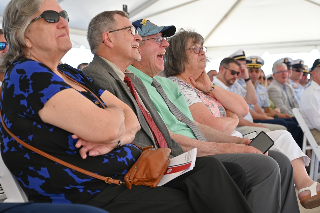 Members of the crowd laugh during a heritage recognition ceremony, June 21, 2024, held in honor of U.S. Coast Guard Cutter Dauntless (WMEC 624) in Pensacola, Florida. Dauntless was recognized for 56 years of service to the nation in the presence of current and former crew members, family and friends before it was placed in commission, special status. (U.S. Coast Guard photo by Petty Officer 2nd Class Brandon Hillard)