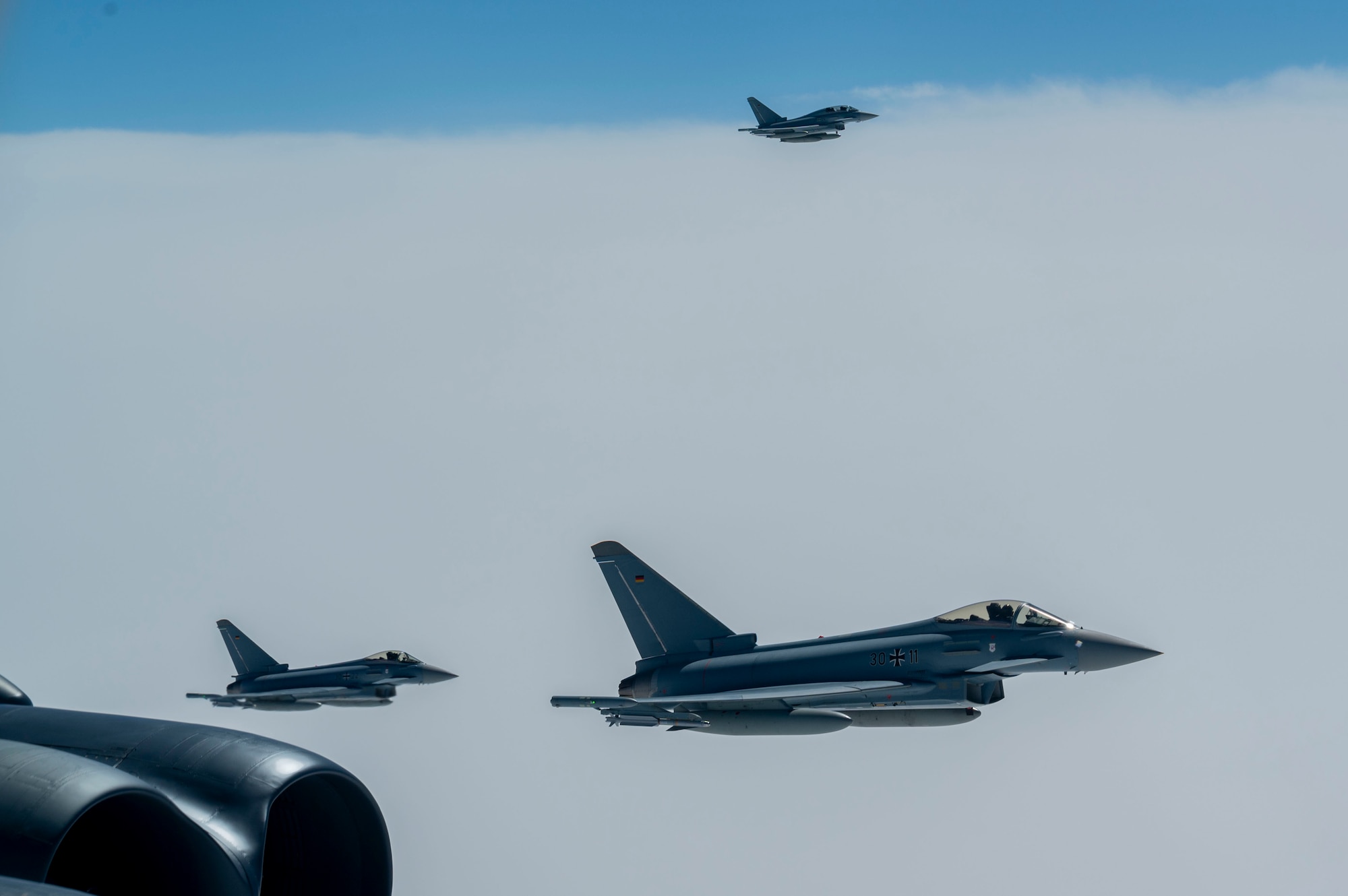 Bomber escorted by fighter jets