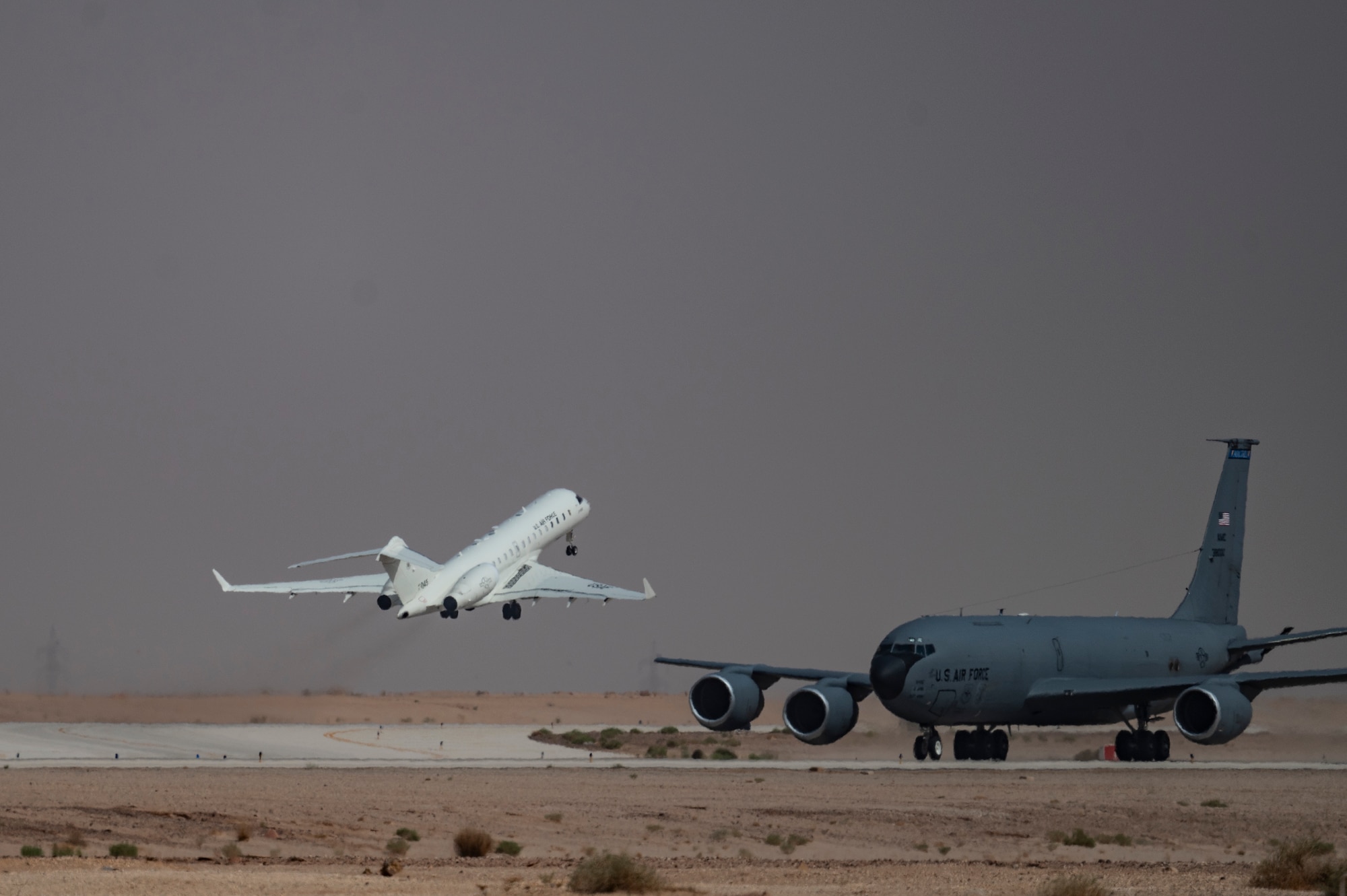 A U.S. Air Force E-11A Aircraft equipped with the Battlefield Airborne Communications Node takes off from an undisclosed location within the U.S. Central Command area of responsibility, May 8, 2024. The E-11 provides a crucial common operating picture that enables all air assets involved in any airdrop mission to deliver aid precisely and on time. (U.S. Air Force photo)
