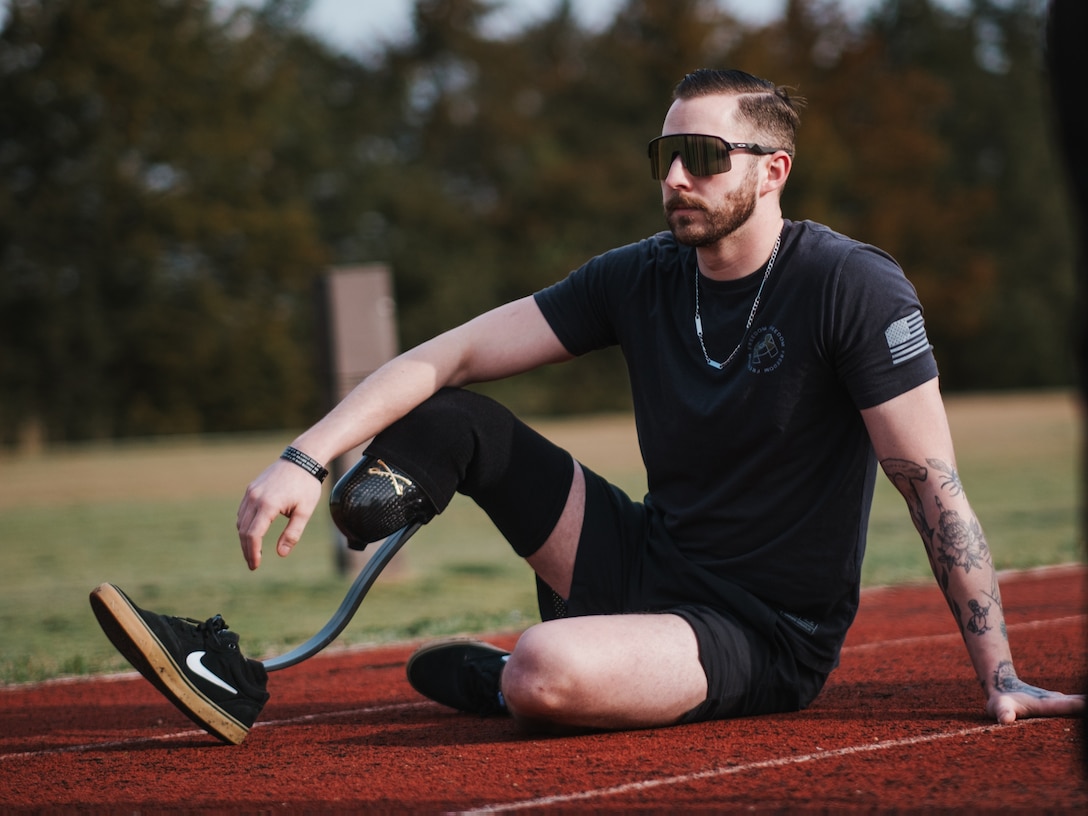 U.S. Army veteran Cpl. Patrick Dayton waits for his turn to compete in the field event at the 2024 Army Trials, Fort Liberty, North Carolina