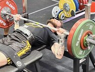 Retired Cpl. Patrick Dayton of Team Army competes in the powerlifting event at the 2024 Department of Defense Warrior Games at the ESPN Wide World of Sports Complex in Orlando, Florida