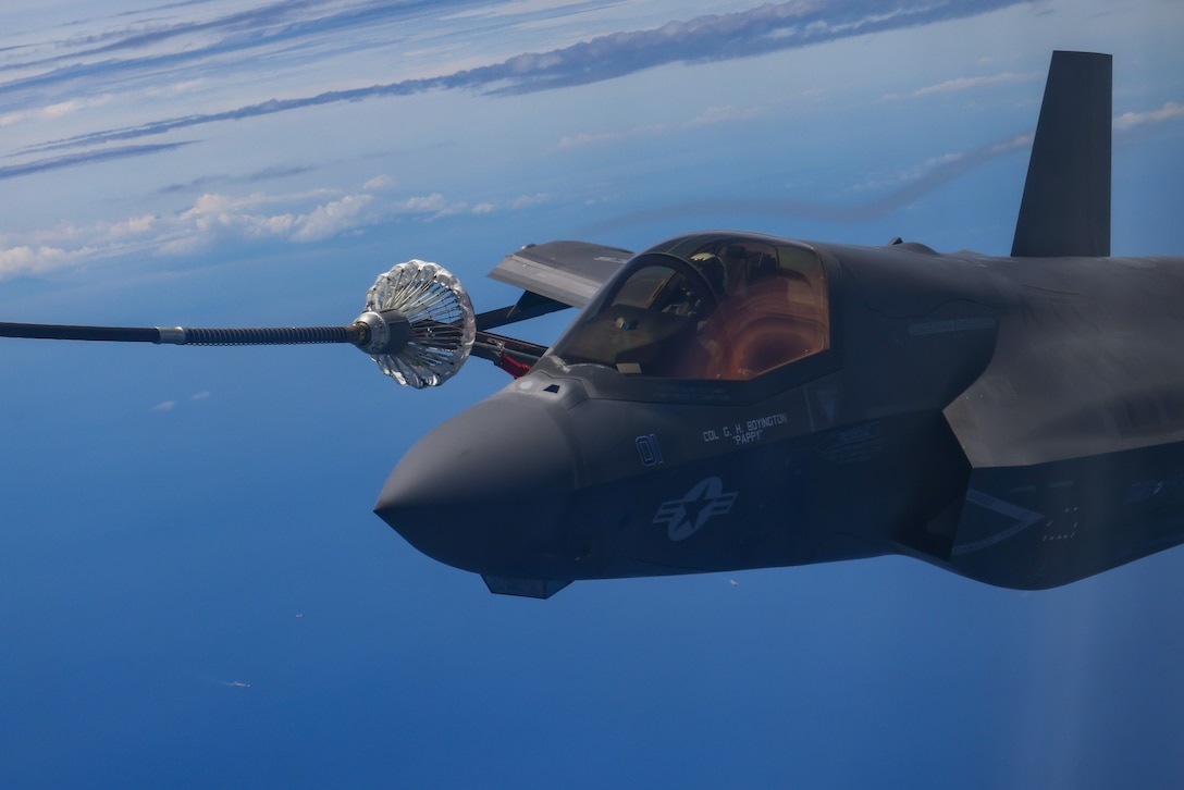 A U.S. Marine Corps F-35B Lighting II with Marine Fighter Attack Squadron (VMFA) 214, Marine Aircraft Group 13, 3rd Marine Aircraft Wing, receives fuel from a KC-130J Super Hercules with Marine Aerial Refueler Transport (VMGR) 352, MAG 11, 3rd MAW, for a littoral live-fire exercise  off the coast of Zambales, Philippines, during Marine Aviation Support Activity 24, June 15, 2024. The LLFX showcased the integrated command and control capabilities of the U.S. and Philippine armed forces in a territorial defense scenario featuring a coordinated bilateral surface and maritime strike. MASA is an annual Philippine-U.S. military exercise focused on mutual defense, strengthening relationships, and rehearsing emerging aviation concepts. MASA is an annual Philippine-U.S. military exercise focused on mutual defense, strengthening relationships, and rehearsing emerging aviation concepts. (U.S. Marine Corps photo by Lance Cpl. Jennifer Sanchez)
