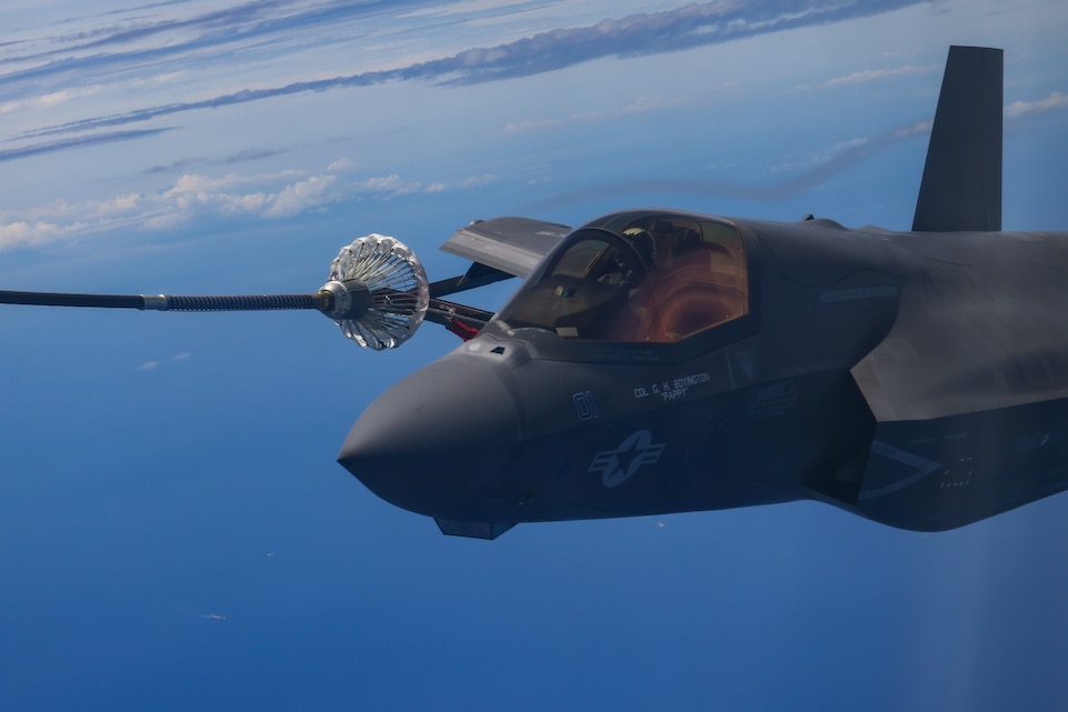 A U.S. Marine Corps F-35B Lighting II with Marine Fighter Attack Squadron (VMFA) 214, Marine Aircraft Group 13, 3rd Marine Aircraft Wing, receives fuel from a KC-130J Super Hercules with Marine Aerial Refueler Transport (VMGR) 352, MAG 11, 3rd MAW, for a littoral live-fire exercise  off the coast of Zambales, Philippines, during Marine Aviation Support Activity 24, June 15, 2024. The LLFX showcased the integrated command and control capabilities of the U.S. and Philippine armed forces in a territorial defense scenario featuring a coordinated bilateral surface and maritime strike. MASA is an annual Philippine-U.S. military exercise focused on mutual defense, strengthening relationships, and rehearsing emerging aviation concepts. MASA is an annual Philippine-U.S. military exercise focused on mutual defense, strengthening relationships, and rehearsing emerging aviation concepts. (U.S. Marine Corps photo by Lance Cpl. Jennifer Sanchez)
