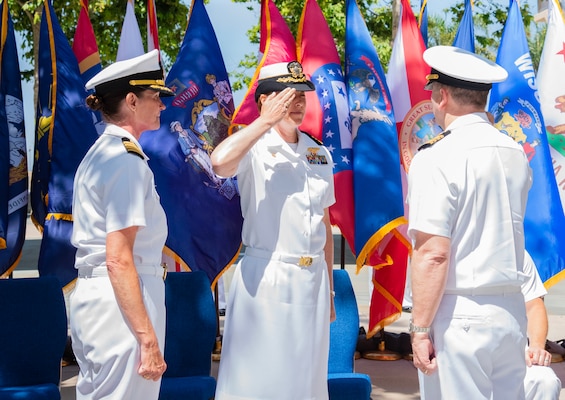 Navy Capt. Kenneth Basford (right), incoming Commanding Officer, Expeditionary Medical Facility 150 Alpha, salutes Capt. Jenny Burkett, Commander, Navy Medicine Readiness and Training Command Camp Pendleton and Director, Naval Hospital Camp Pendleton, during the change of command ceremony for EMF 150 Alpha held June 21, 2024, aboard Marine Corps Base Camp Pendleton. Basford assumed command from outgoing commanding officer Capt. Elizabeth Smith who will transition to her new position within the 1st Marine Logistics Group.