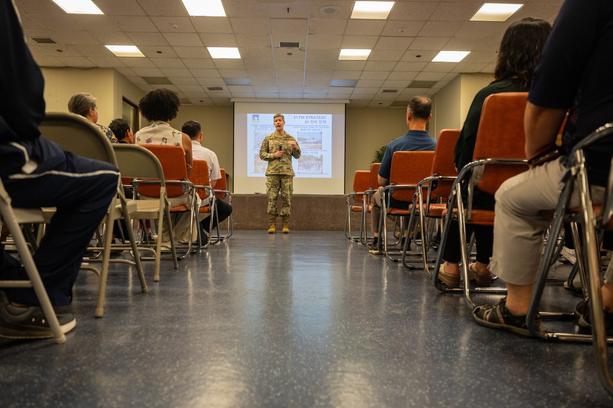 U.S. Air Force Col. William McKibban, 51st Fighter Wing commander, speaks to attendees during a civilian all call at Osan Air Base, Republic of Korea, June 18, 2024. The all call emphasized the contributions to the “Fight Tonight” mission made by civilian members of the fighter wing and how their continuity is important to help support the mission. (U.S. Air Force photo by Staff Sgt. Christopher Tam)